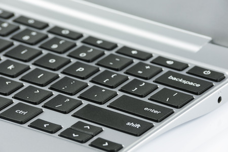 Close up of the keyboard in the prestigious silver laptop