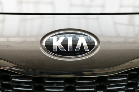 Nowy Sacz, Poland - March 29, 2017: KIA Motors Company sign on front of the car. Kia is a South Korean manufacturer of automobiles and commercial vehicles.