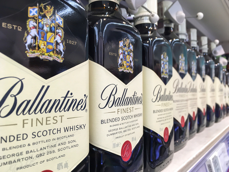 Nowy Sacz, Poland - April 16, 2017: Bottles of Ballantine's Finest Blended Scotch whisky on store shelves for sale in Tesco Hypermarket.のeditorial素材