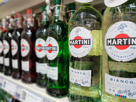 Nowy Sacz, Poland - June 16, 2017:Bottles of various types of Martini Bianco Vermouth on store shelves for sale in Tesco Hypermarket. Martini is a brand of Italian vermouth, named after the Martiniのeditorial素材
