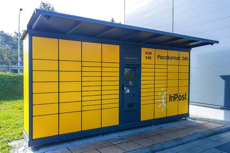 Gorlice, Poland - august 30, 2017: InPost Paczkotam automated parcel locker on the street of Gorlice in Poland.のeditorial素材