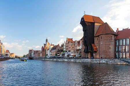 Gdansk, Poland - June 26, 2018: View of the old city of Gdansk on the Motlawa River and famous medieval port crane.のeditorial素材