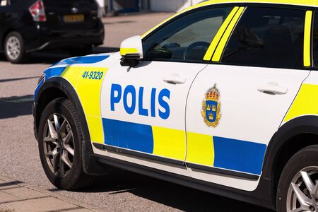 Stockholm - Skavsta, Sweden - August 09, 2019: The Swedish police (Polis) patrolling car on the street of Stockholm - Skavsta during police intervention.のeditorial素材