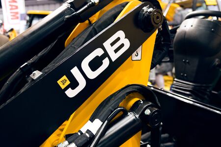 Kielce, Poland, March 16, 2019: JCB sign on a heavy machinery. J.C. Bamford Excavators Ltd. is a British manufacturer of heavy industrial and agricultural vehicles.のeditorial素材