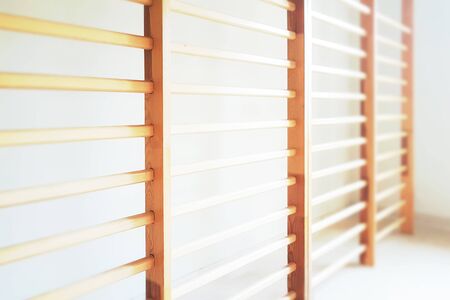 Healthy lifestyle background - close-up of wall bars in the school gymnastic hall ( selective focus)