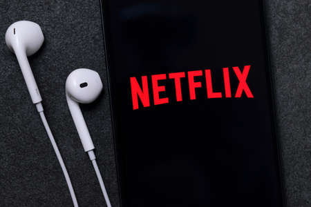 Krakow, Poland - October 07, 2020: Netflix application sign on the smartphone screen. Netflix is a famous provider of Internet streaming  service for watching videoのeditorial素材