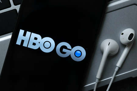 Krakow, Poland - October 07, 2020: HBO GO application sign on the smartphone screen. HBO GO is a famous provider of Internet streaming  service for watching videoのeditorial素材