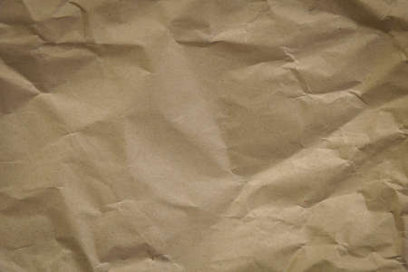 Crumpled brown paper full frame texture backgroundの写真素材