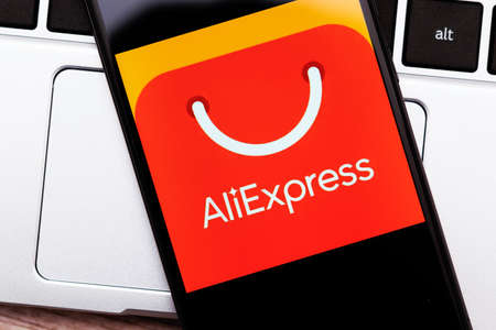 Krakow, Poland - November 08, 2020: AliExpress sign on the smartphone screen. AliExpress is popular internet shopping platform created by Alibaba.のeditorial素材