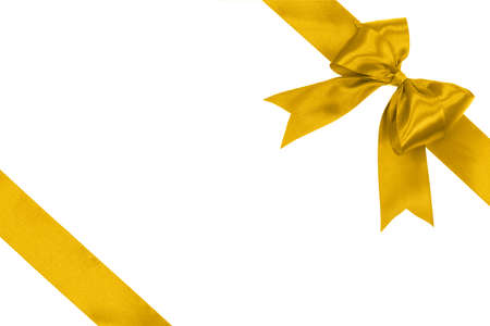 Gift card concept - shiny golden satin ribbon with bow isolated on white backgroundの写真素材
