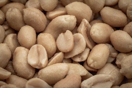 close up of salted peanuts as a background. Toned.