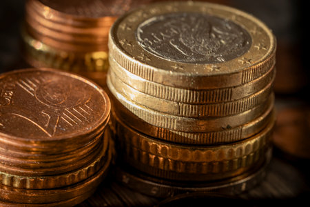 Euro coins money (EUR), currency of European Union over dark background