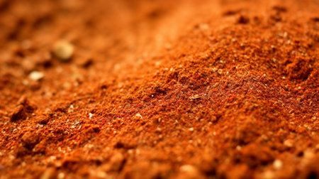 Ground spices background. dry red chili pepper flake. pile of red chili pepper flakeの素材