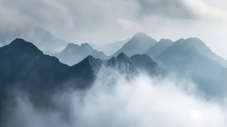 A majestic mountain range shrouded in mist, evoking a sense of mystery ...
