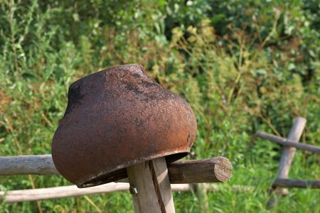 Old cast-iron rusty potの写真素材