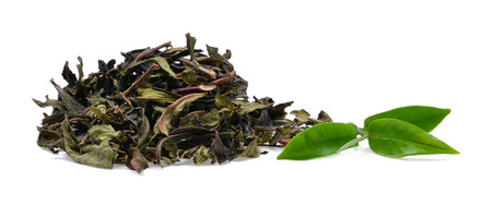Green tea leaf isolated on white backgroundの写真素材