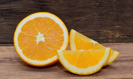 orange fruit on wooden tableの写真素材