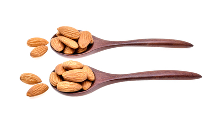 Almonds isolated on white backgroundの写真素材