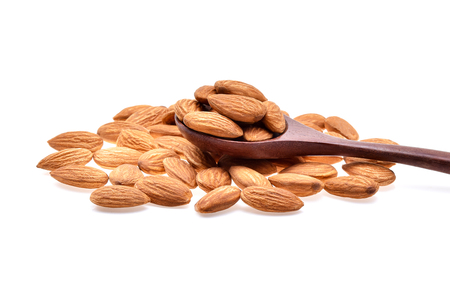 Almonds isolated on white backgroundの写真素材