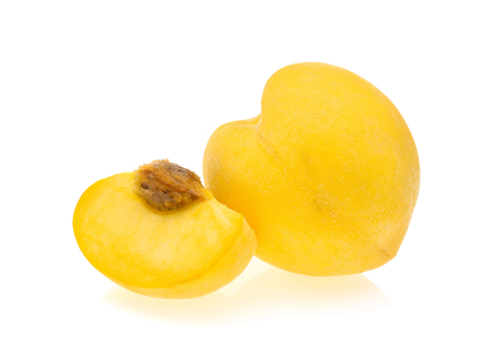 Yellow peach isolated on the white backgroundの写真素材