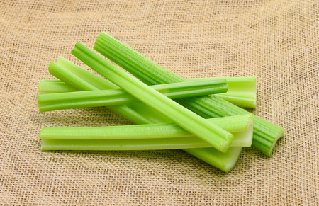 celery on rustic fabric backgroundの写真素材