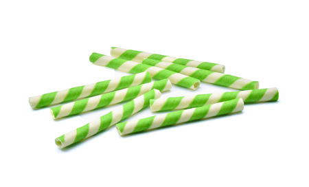 green stripe wafer rolls isolated on white Backgroundの写真素材