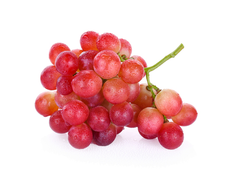 red grapes with water drops isolated on white backgroundの写真素材