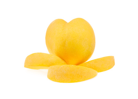 Yellow peach isolated on the white backgroundの写真素材