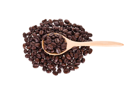 roasted coffee beans isolated in white backgroundの写真素材