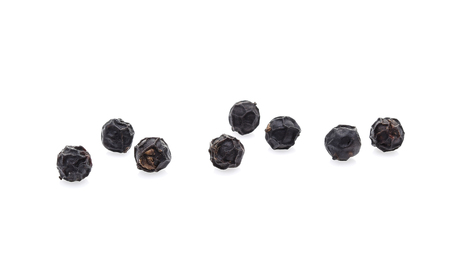Black pepper isolated on white backgroundの写真素材
