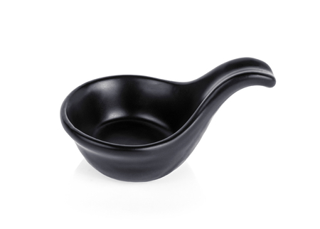 black ceramic spoon on white backgroundの写真素材