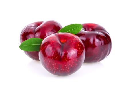 red cherry plum isolated on white backgroundの写真素材