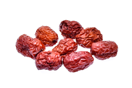 Dried red date or Chinese jujube on white backgroundの写真素材