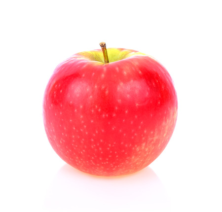 pink lady apple isolated on white backgroundの写真素材