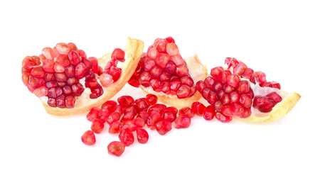 Pomegranate seed pile isolated on white backgroundの写真素材