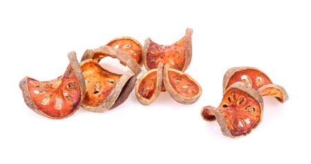 Dry bael fruit isolated on white backgroundの写真素材