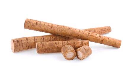 Burdock roots isolated on whiteの写真素材