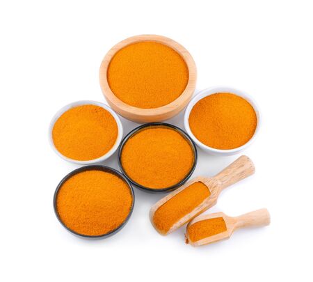 Turmeric powder isolated on white backgroundの写真素材