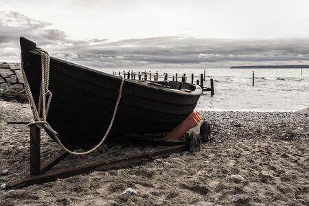 A fishing boat on the beach at Vitt on the island of RÃ¼gen in Mecklenburg-Western Pomeraniaの写真素材
