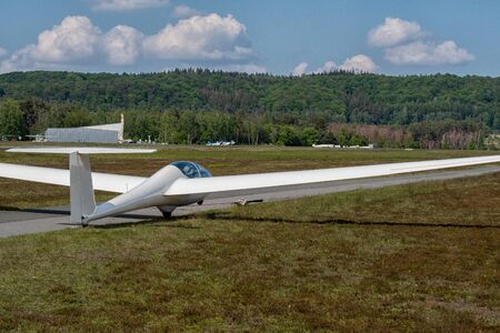 A glider taking off at the airfield