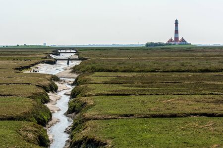 The Westerhever lighthouse on the North Seaの写真素材