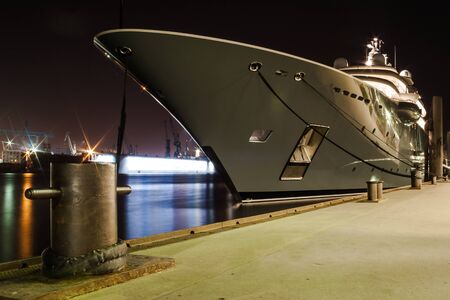 A luxury yacht at the Landungsbrücken in Hamburgの写真素材