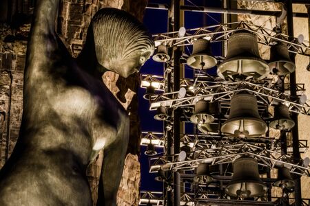 The earth angel in the Sankt Nikolai church in Hamburg at nightの写真素材