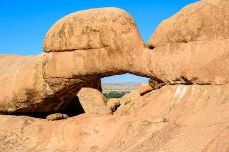 The Bridge, a natural arch at Spitzkoppe, Namibiaの写真素材