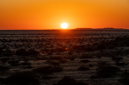 Impression of the Rocky Namibian Desert near Spitzkoppe during the golden hour around sunset.の写真素材