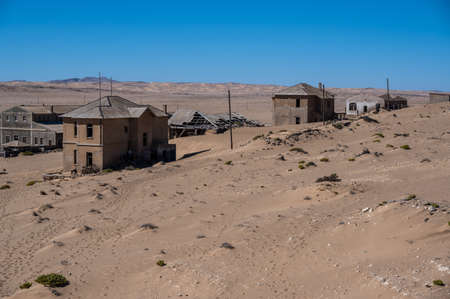 Abandoned house filled with desert sand in Kolmanskop, Namibiaの写真素材