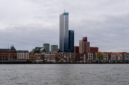 Old houses and high-rise building in Rotterdamの写真素材