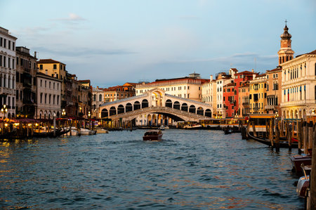 Panoramic view of famous Canal Grande with famous Rialto Bridge at sunset in Veniceの写真素材
