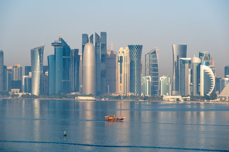 Dhow near West bay sky scrapers in Dohaの写真素材