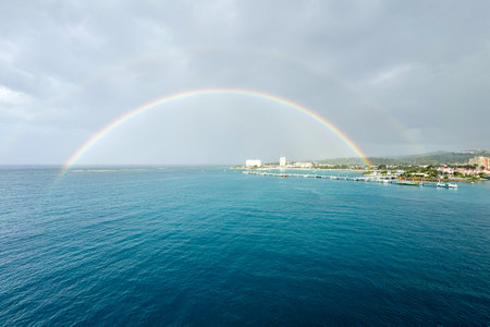 Rainbow over the coast of Ocho Rios in Jamaicaの写真素材